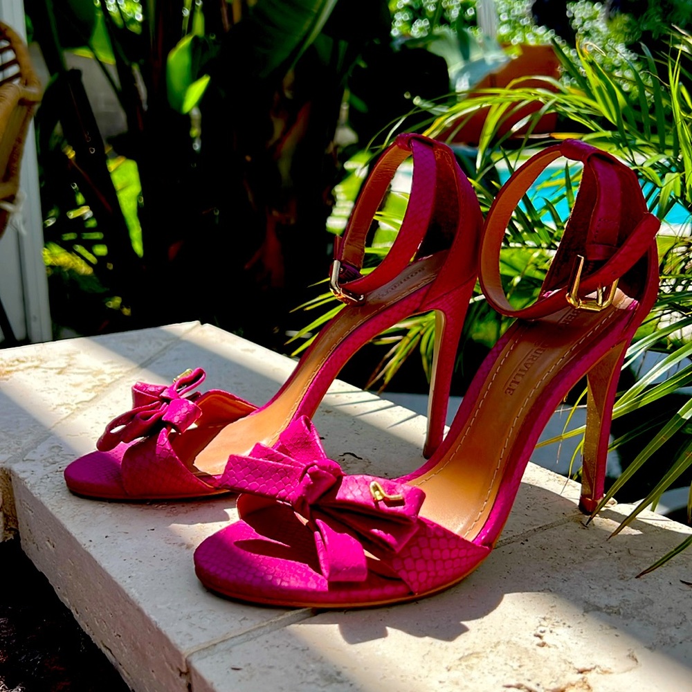 Beautiful raspberry color heels very gently worn